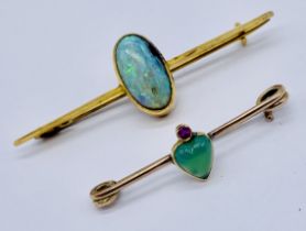 Two 9ct gold brooches, one set with an opal (cracked) and the other, heart shaped jade with a ruby