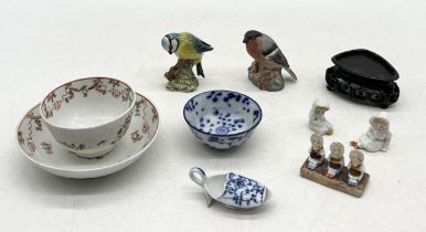 A small collection of china including Chinese tea bowl and cup, Beswick and Royal Worcester birds,