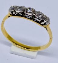 A diamond 5 stone ring set in unmarked 18ct gold, size P