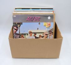 A small quantity of various 12" vinyl records, including The Faces, ACDC, The Rolling Stones, Blue