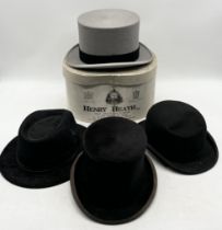 A collection of vintage hats including boxed Austin Reed top hat, Lock & Co etc.