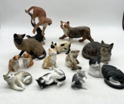 A collection of various cat figurines including Royal Worcester "Kittens", Rushton Pottery, Franklin