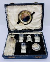 A cased hallmarked silver travelling Communion set by William Sush & Son, Sheffield 1957