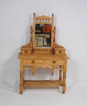 A turn of the century pine dressing table, with four drawers and bobbin turned detailing - length