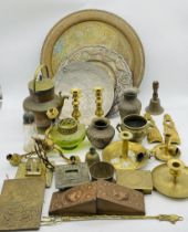 A collection of brass and copperware including candlesticks, vases, bowl, trays etc