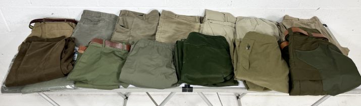 A collection of various men's country and shooting trousers including Barbour, Fjall Raven,