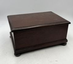 An antique mahogany box