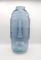 A large art glass vase in the form of an Easter Island head - height 68cm