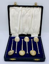 A cased set of hallmarked silver coffee spoons