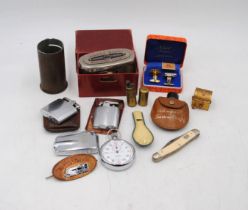 A mixed lot including a boxed "Abbey Road" building society tin, Ronson lighters, a small brass