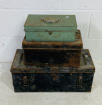 An ammo crate, a metal tin and a cash box
