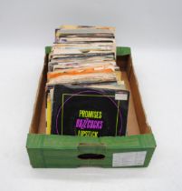 A quantity of various 7" vinyl records, including The Sex Pistols, The Undertones, Sham 69, The