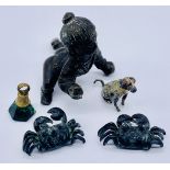 A small bronze Lord Krishna figure "The Butter Thief" along with two small bronze crabs, cold