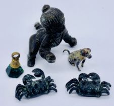 A small bronze Lord Krishna figure "The Butter Thief" along with two small bronze crabs, cold