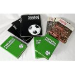 A collection of vintage football magazines including Football Handbook and Book of Football
