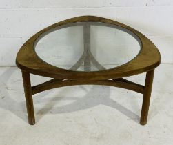 A mid-century Nathan coffee table with glass top.