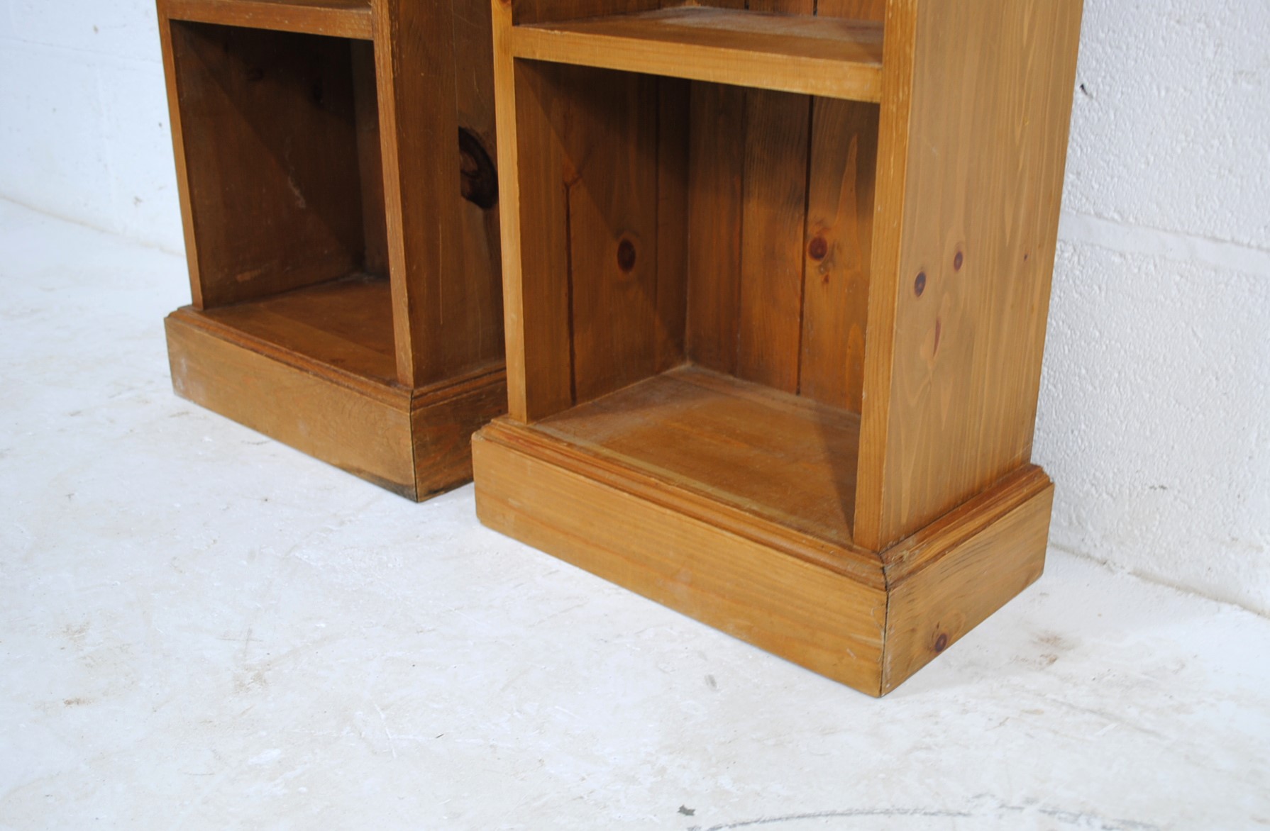 A pair of narrow pine bookcases - length 35.5cm, depth 20.5cm, height 128cm (each) - Image 4 of 4