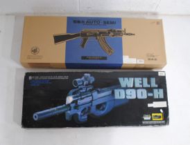 A boxed Double Eagle AK47 automatic electric airsoft BB gun, along with a boxed Well D90-H (P90