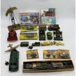 A collection of military related toys including HO Model Miniatures Minitanks, two boxed Blue Box "