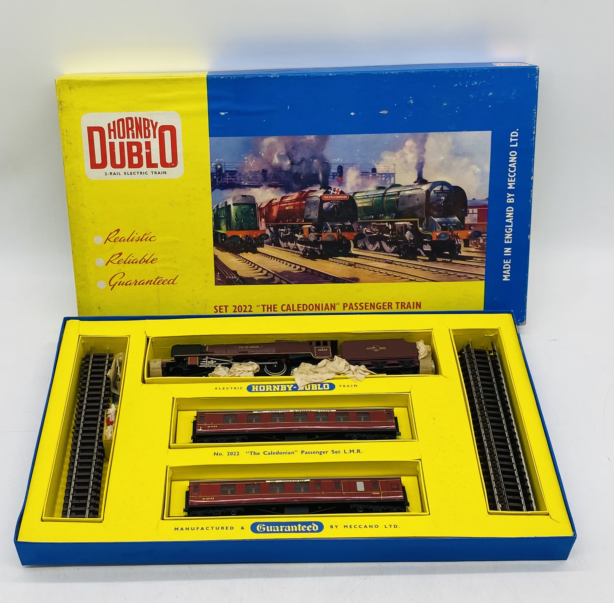 A boxed Hornby Dublo 2-Rail Electric 2022 "The Caledonian" Passenger Train set comprising of British - Image 2 of 6
