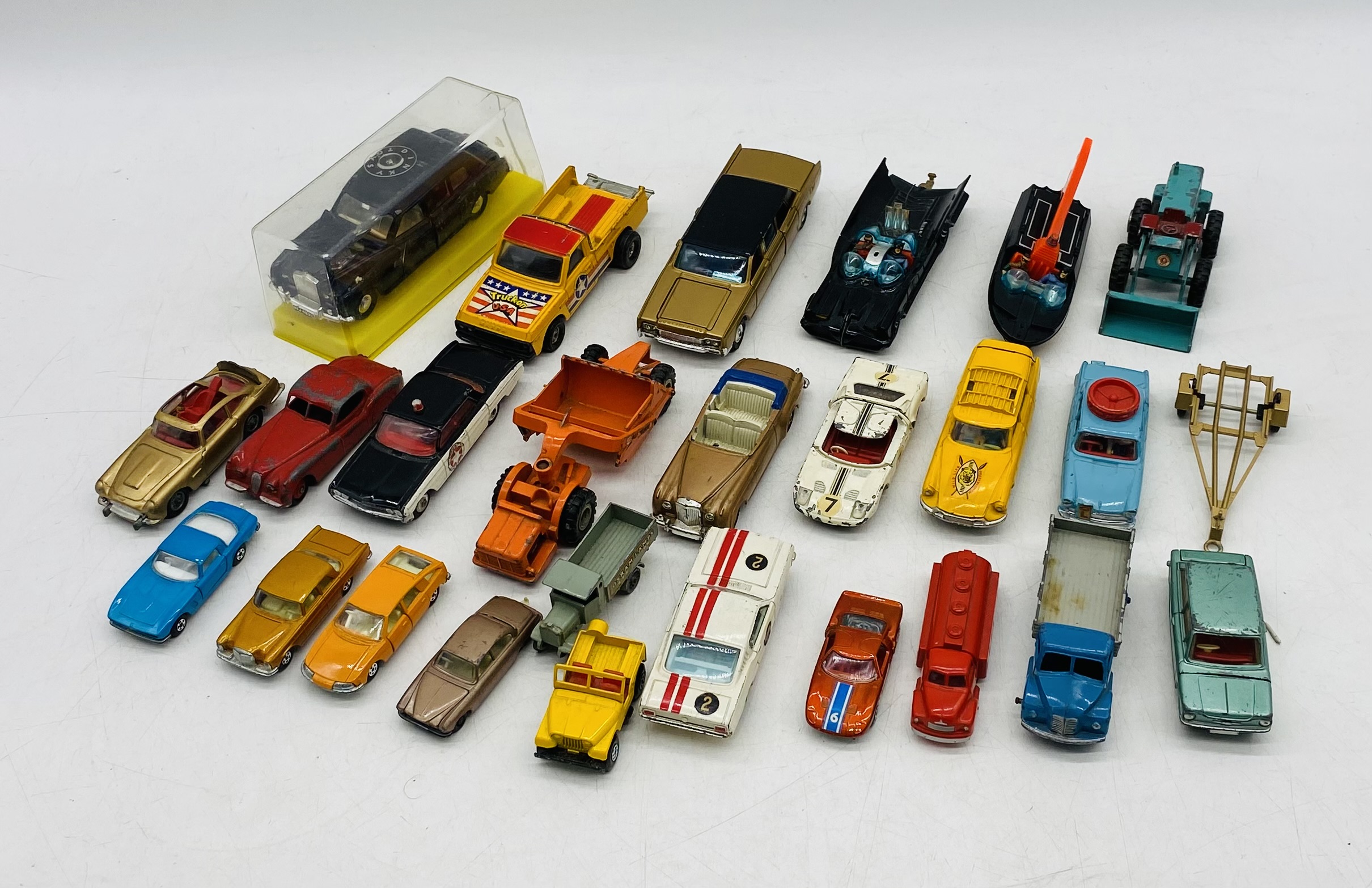 A collection of loose die-cast vehicles including Corgi Toys Batmobile & Batboat, Lesney,