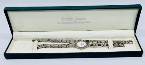 A ladies Rotary Elite Sterling silver wristwatch along with a matching bracelet