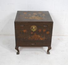 A small Oriental carved wooden trunk, with inner tray and single drawer under - length 52cm, depth