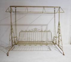 A vintage metal swing seat with ornate scroll decoration, no awning or cushions, 230cm width, 156 cm