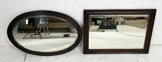 Two antique wooden framed mirrors with carved detailing