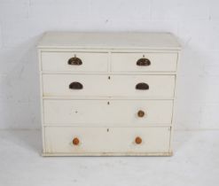 A white painted pine chest of five drawers - one handle missing - length 98.5cm, depth 44.5cm,