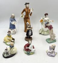 A collection of Royal Doulton and other figurines including Windflower (damage to base), Picnic,