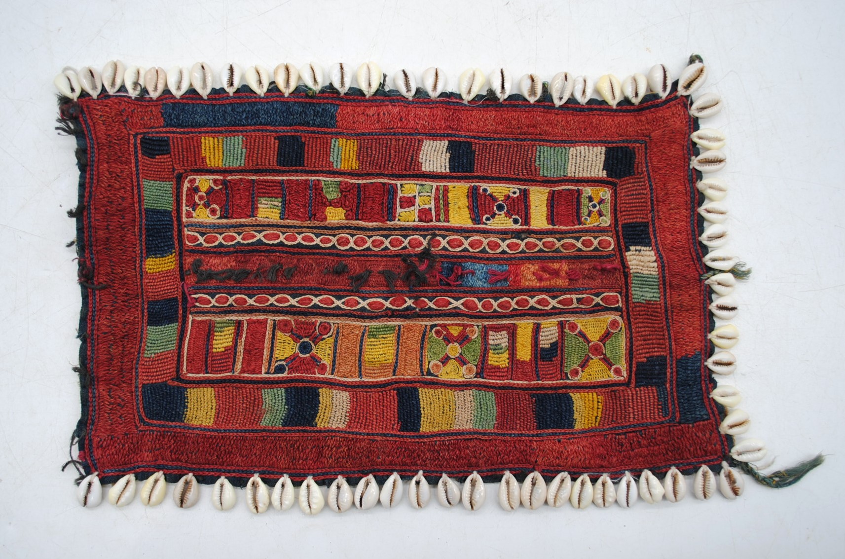 A Banjara nomadic Indian textile head-covering, with geometric designs and cowrie shell border, - Image 2 of 7