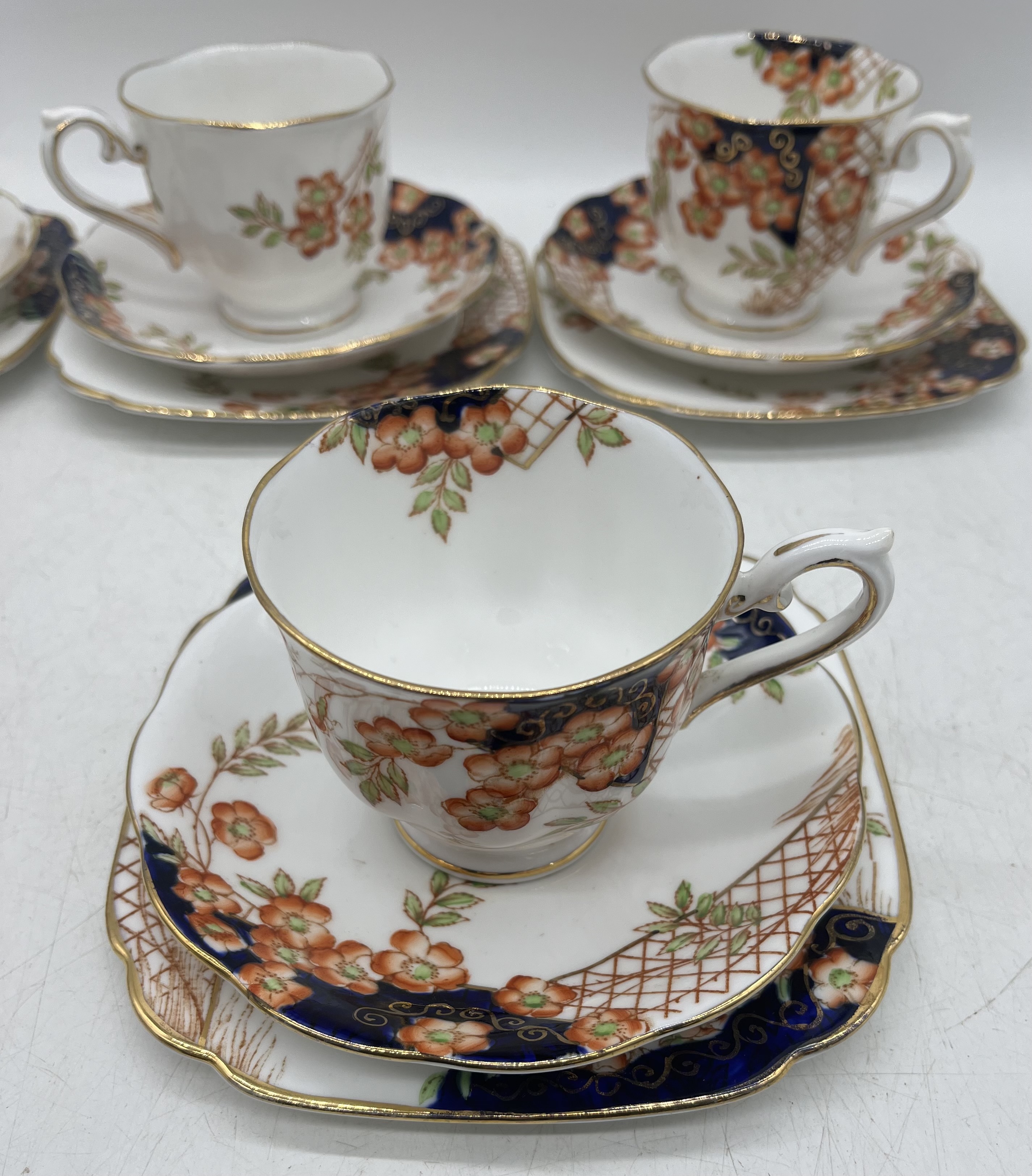 A Royal Albert Crown China tea set pattern 938015 including one sandwich plate, six trios, a milk - Image 4 of 12