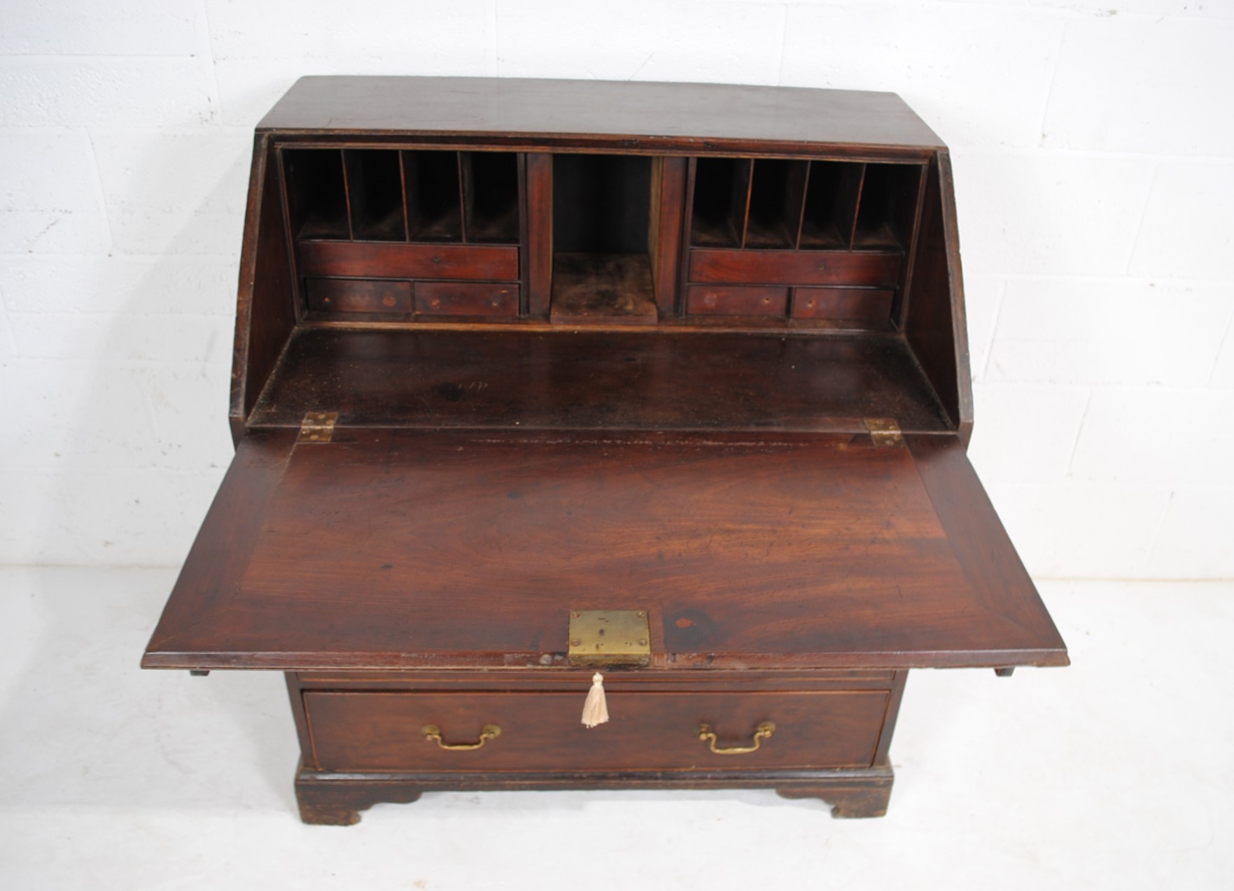 A Georgian mahogany bureau, with five drawers with brass handles, raised on bracket feet, with - Image 4 of 9