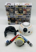 A collection of six boxed Pop Vinyl Figures including Star Wars "Rey", Independence Day "Jack