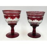 A near pair of large Bohemian ruby glass goblets - 20cm high