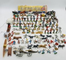 A collection of various plastic toy figurines including Britains American War of Independence set (