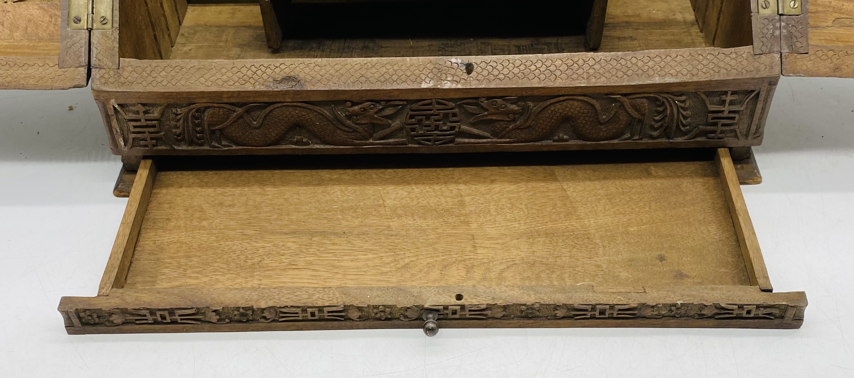 An Oriental heavily carved hardwood stationary box, with key - length 44cm, depth 24cm, height 31cm - Image 4 of 7