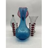 A collection of various art glass including pair of Bohemian glass vases, Italian fish shaped bottle