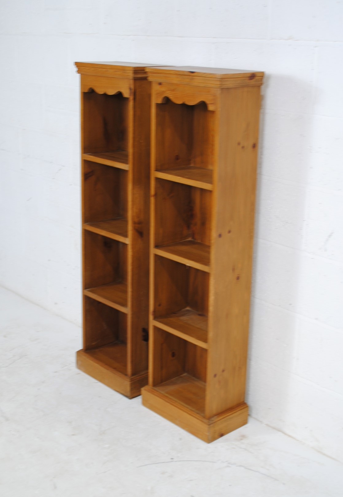 A pair of narrow pine bookcases - length 35.5cm, depth 20.5cm, height 128cm (each) - Image 2 of 4