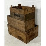 Three vintage wooden crates, one marked "Eggs" (both sides) with rope handles, one marked "J&F