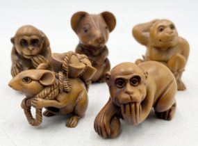 A collection of wooden netsukes of monkeys and rats (one unsigned)