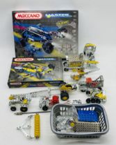 Two Meccano Master Connection boxed sets (contents unchecked), along with a selection of pre-built