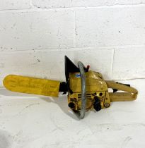 A McCulloch PM374 chain saw (UNTESTED)