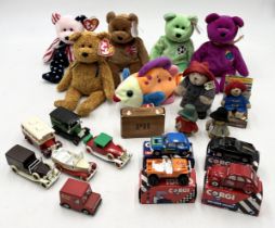 A collection of various toys including Ty Beanie Babies, Corgi Die Cast, Paddington Bear etc.