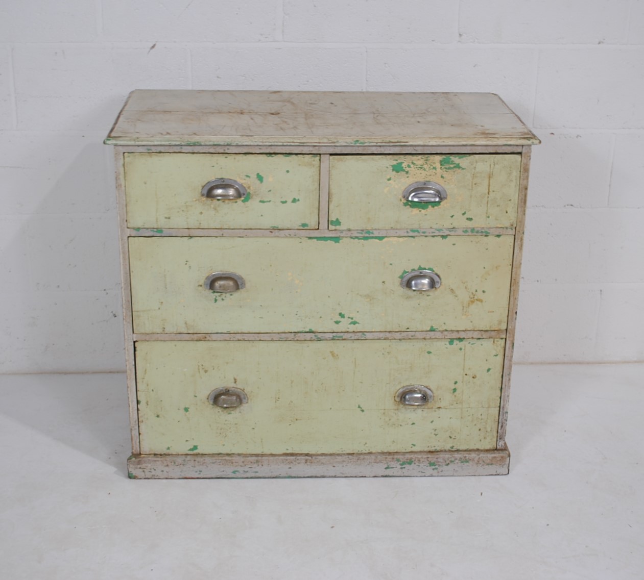 A painted pine chest of four drawers - length 91cm, depth 45cm, height 83cm