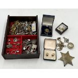 A collection of vintage costume jewellery including rings, fob etc.
