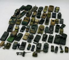 A collection of plastic military toy vehicles including tanks, jeeps, armoured vehicles - some A/F