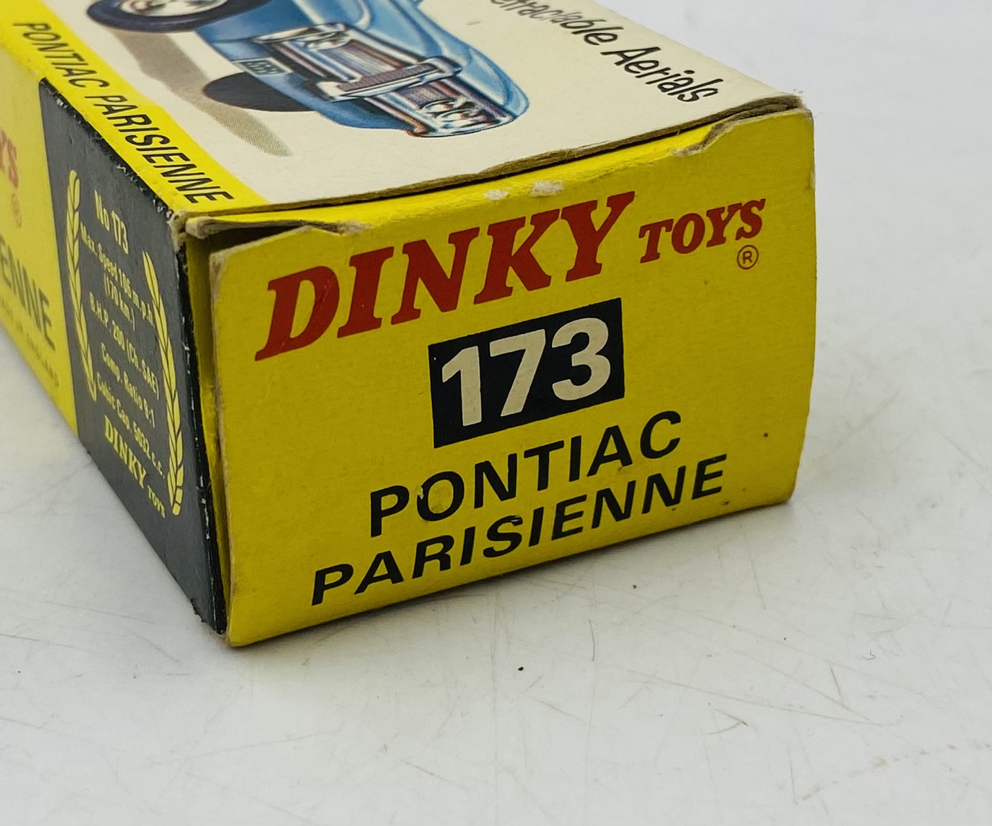 A vintage boxed Dinky Toys Pontiac Parisienne die-cast car in metallic red with a yellow interior ( - Image 6 of 7