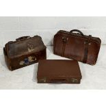 Three vintage leather cases including Gladstone bag, small suitcase etc.
